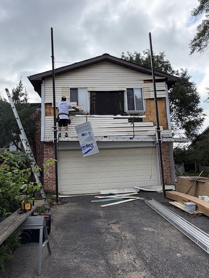 JLF crew installing exterior siding